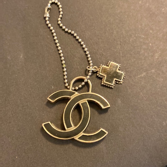 Chanel black and silver keychain with Sterling cross accent piece
